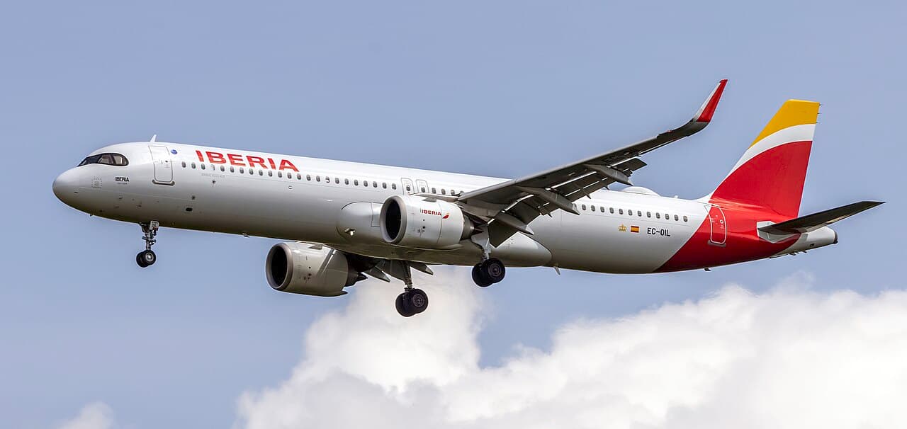 Airbus A321XLR taxiing at major airport with premium cabin branding